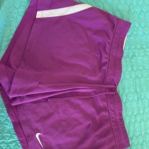 Purple Nike running shorts